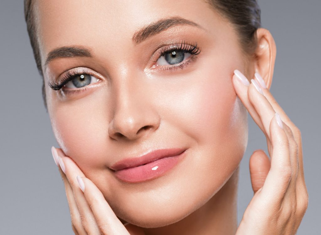 Skincare Tips and Tricks. Beautiful eyes and lips healthy clean skin woman portrait close up