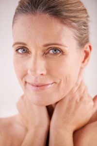 Love the skin youre in. Cropped studio portrait of a beautiful mature woman.
