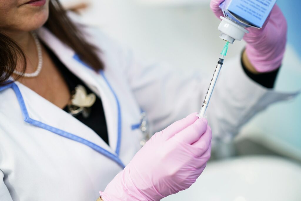 Dermal Fillers Types
Aesthetic doctor preparing the syringe with the botox